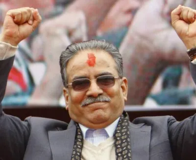 अ